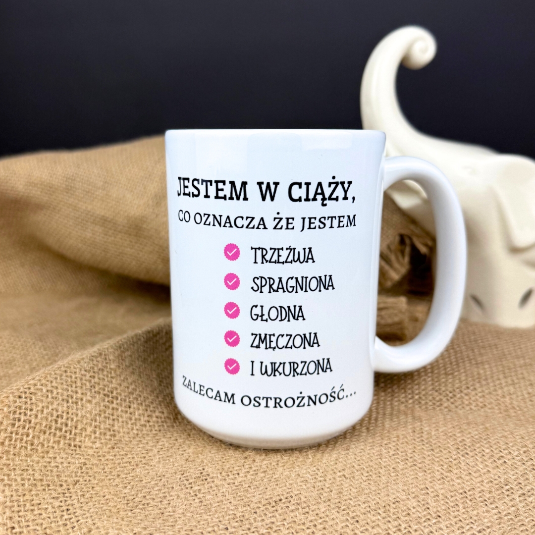 Kubek jestem w ciąży co oznacza że jestem tzreźwa spragniona głodna zmęczona i wrażliwa