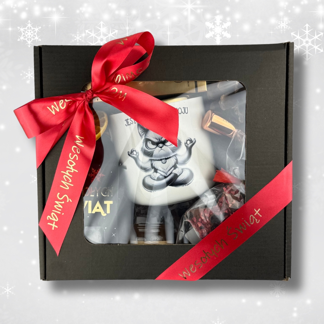 Zestaw prezentowy zapakowany czerwona wstążka